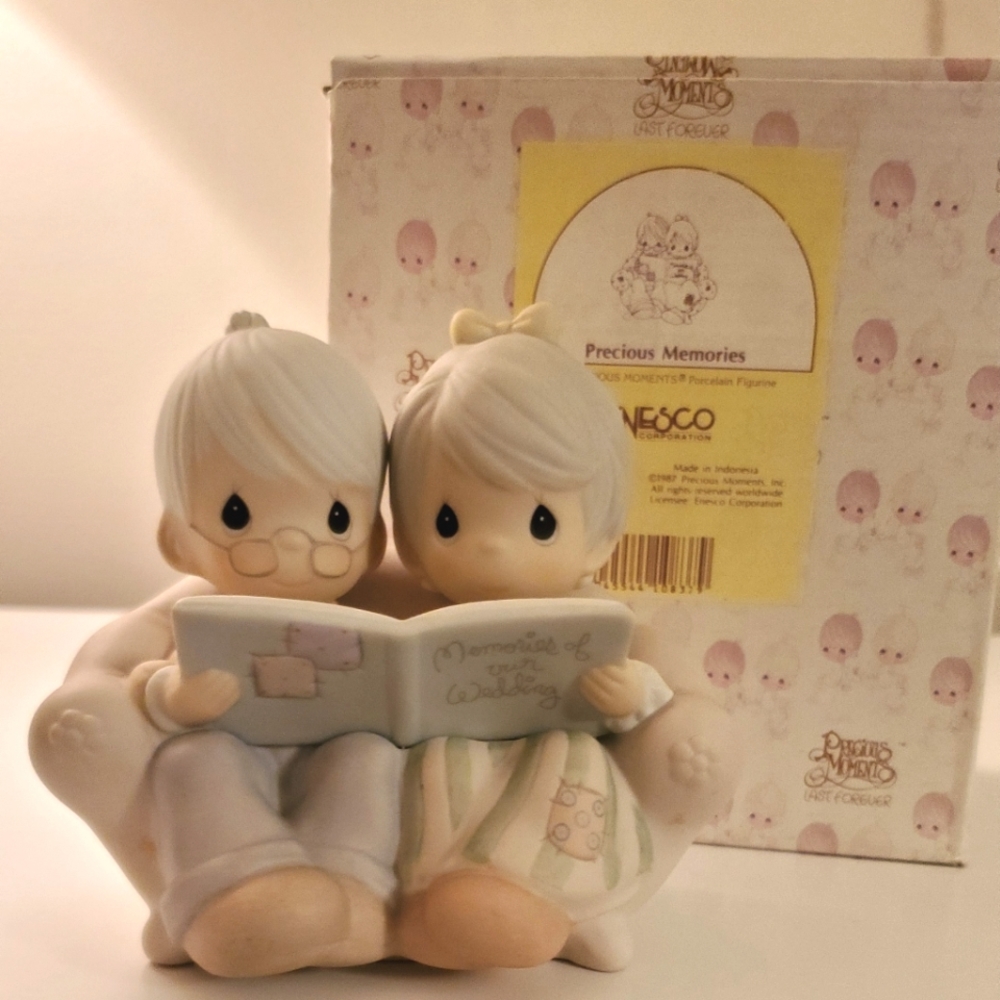 Precious Moments precious memories figurine.